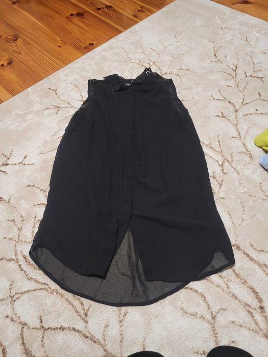 Sprzedam czarną prześwitującą bluzkę na krótki rękaw