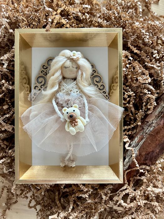 Aniołek w złotej ramce