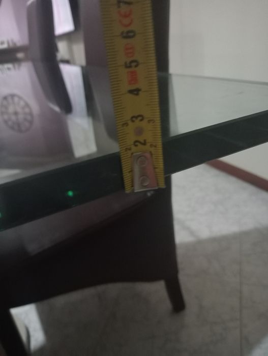 Mesa em vidro com bases de marmore