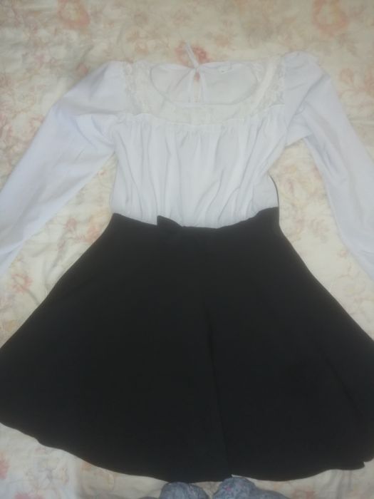 Шкільна сукня для дівчинки .