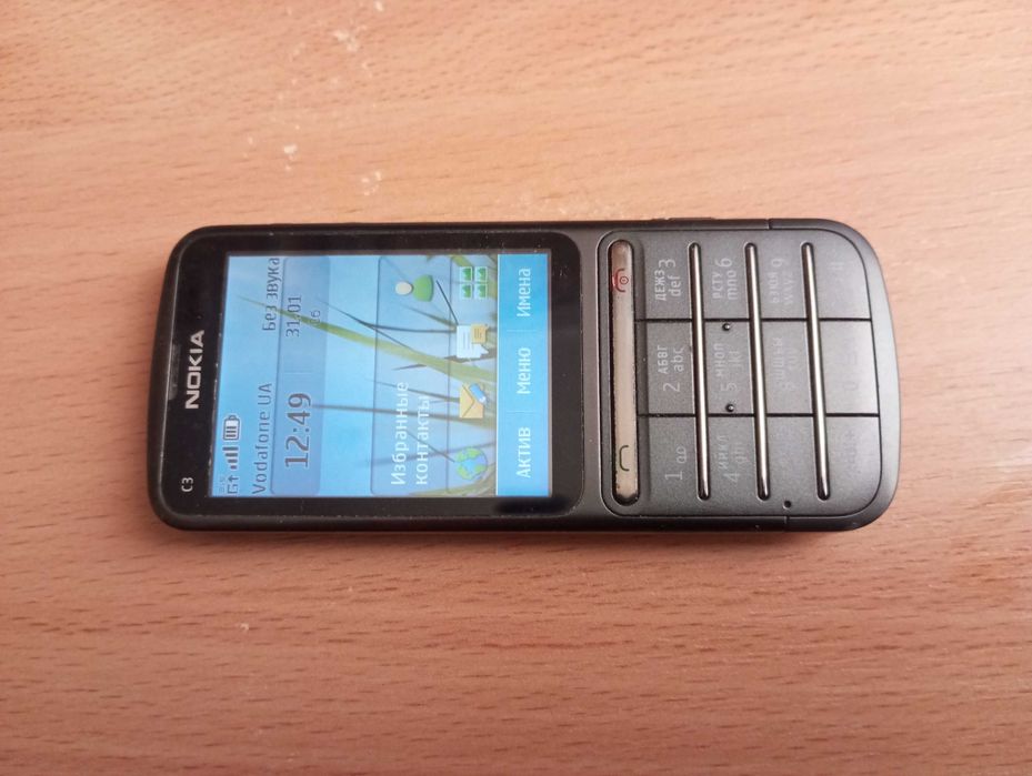 Мобильный телефон Nokia C3-01 сенсорно кнопочный звонилка