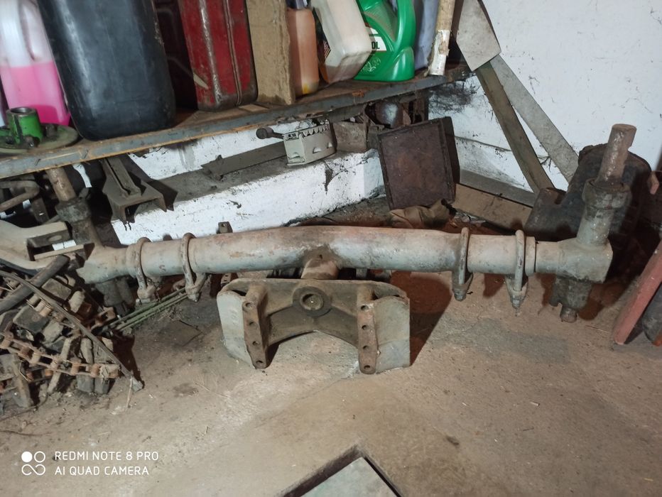 Oś ze wspornikiem do C-360