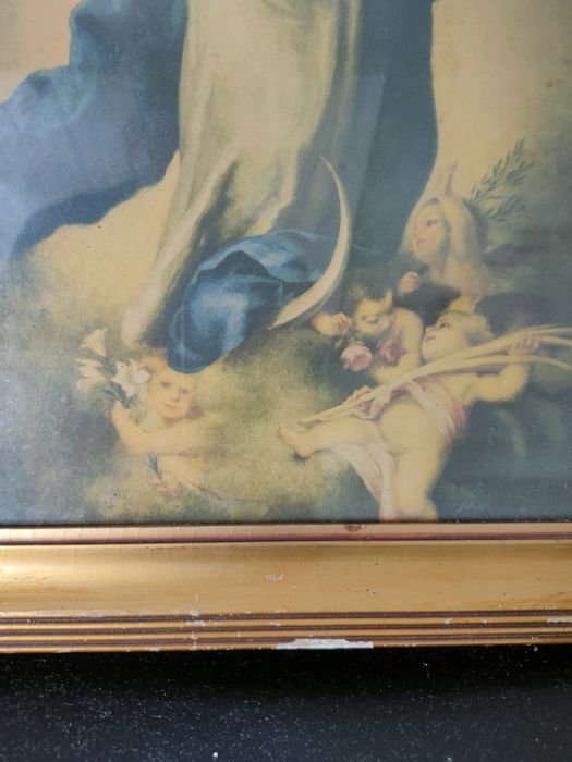 Moldura antiga com imagem da "Imaculada Conceição".