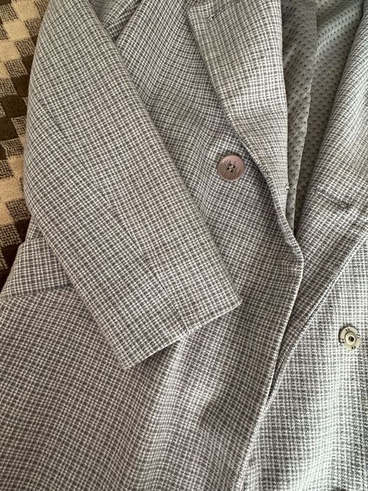 Стильне пальто-піджак у клітинку