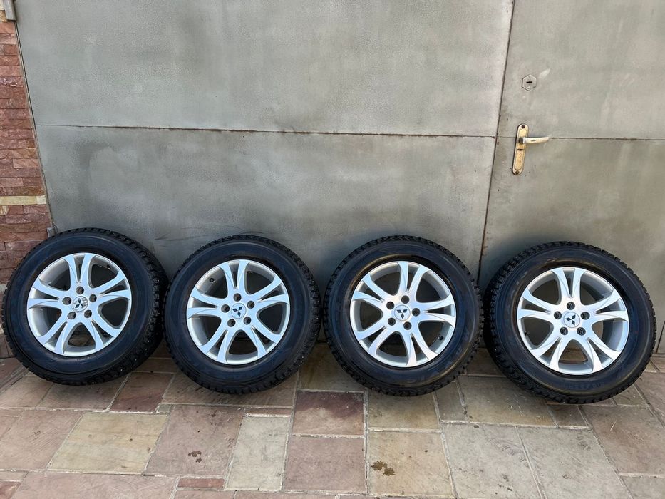 Диски з шитами Mitsubishi 215/65 r16