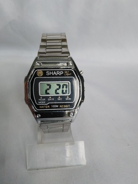 Часы электронные "Sharp"  в коллекцию ,новые.