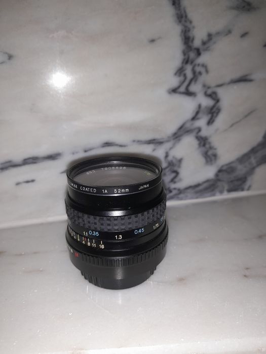 Objectiva maq fotografica