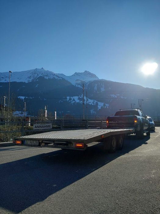 Wynajem lawety przyczepy auto pomoc drogowa wypozyczenie holowanie laweta transport Jelenia Gora Polska EU