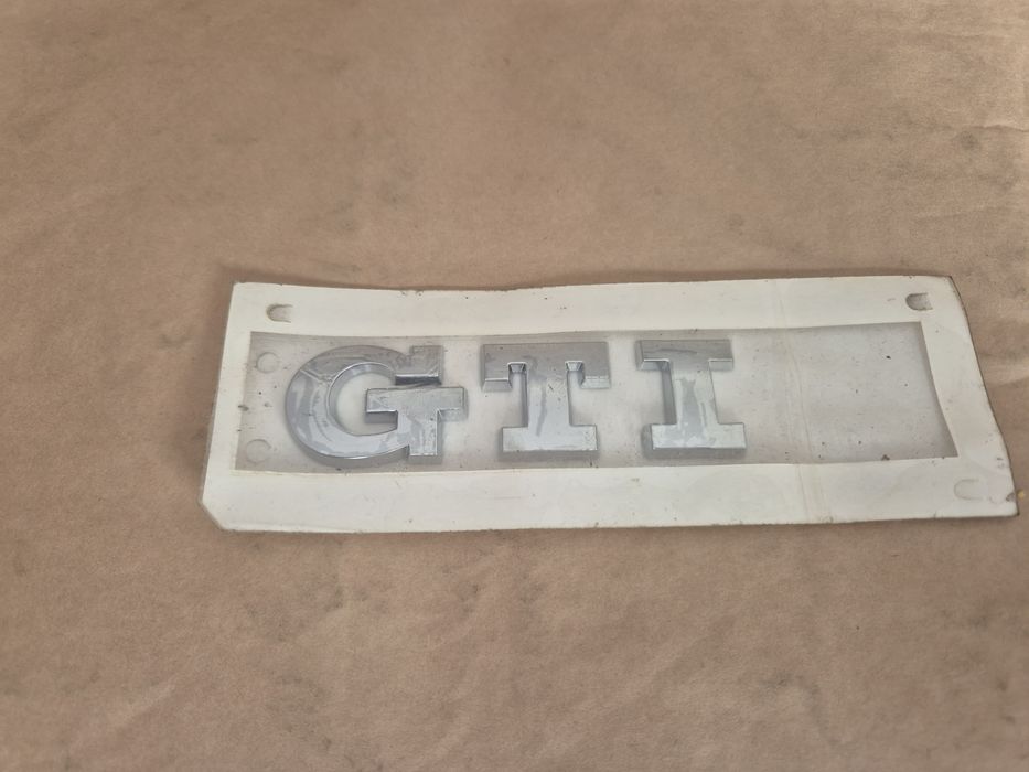 nowy napis GTI  do VW na tylna klape  + szablon montażowy