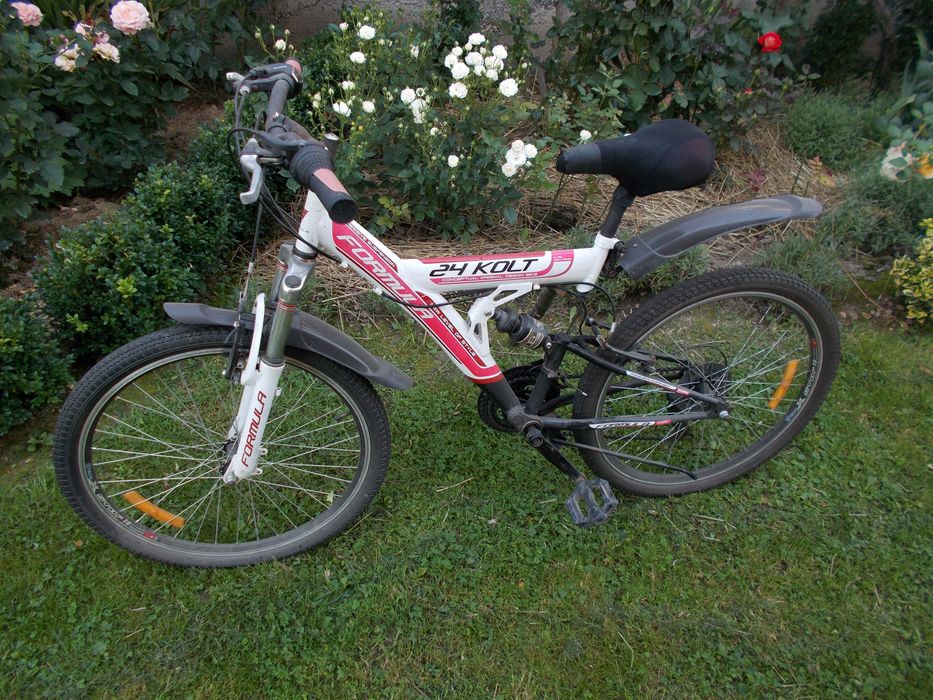 Велосипед універсальний, двопідвіс, колеса 24, стан нового