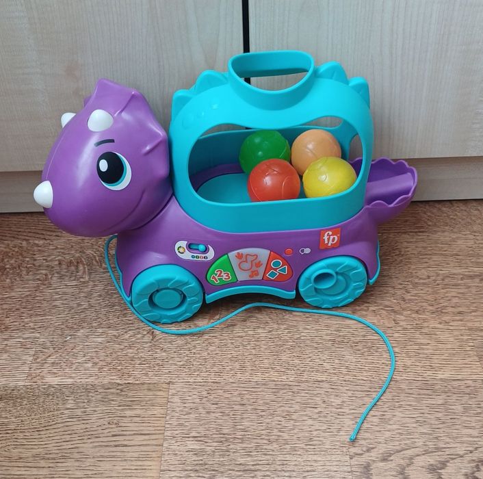 Інтерактивна розвиваюча іграшка каталка Веселий трицератопс від Fisher-Price