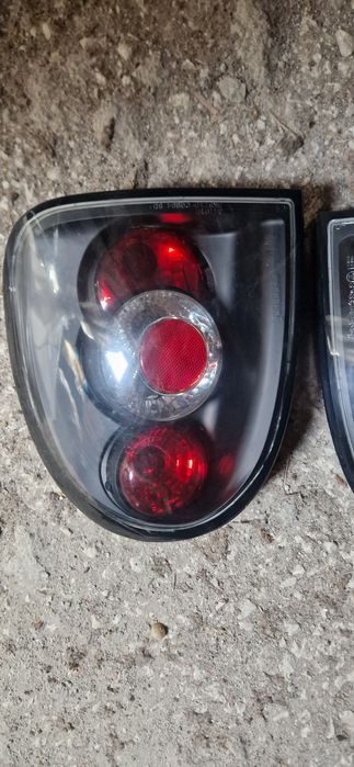 Farolins traz opel corsa b