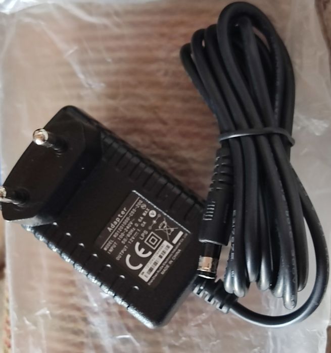 Новый .Блок питания  для модема