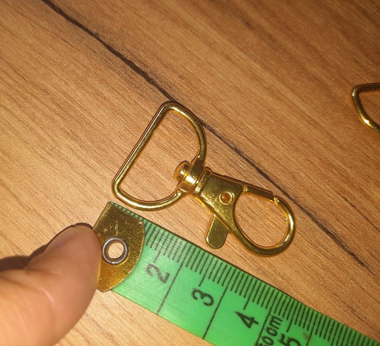 Złote, obrotowe klamry do torebki