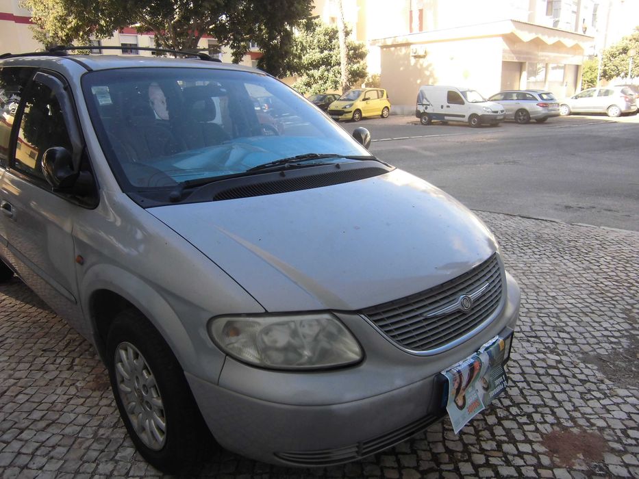 CHRYSLER VOYAGER em  otimas condiçóes vendo porque   fiquei com outra viatura comprei.a com 20.000klm e está impecavel motor e acessorios