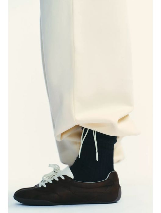 Спортивні  молочні штани Zara