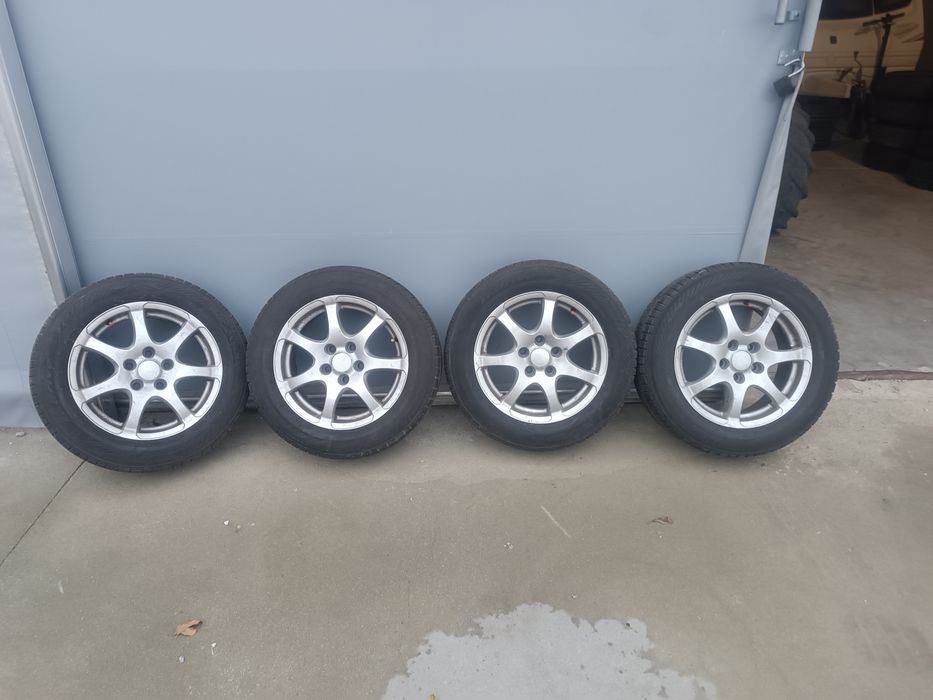 Komplet kół aluminiowych 5x115 16 opony zimowe 205/60R16