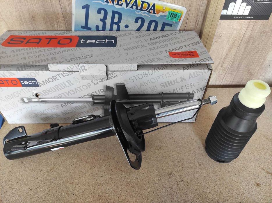 Амортизатор передній лівий з пильником та відбійником Jeep Cherokee