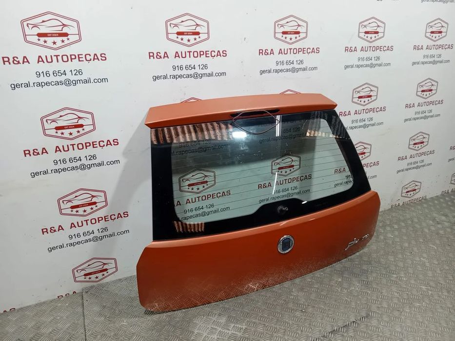 Tampa de Mala Fiat Grand Punto 199 Original