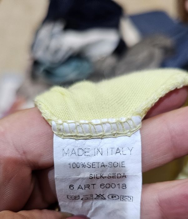 T-shirt túnica sem mangas com folhos