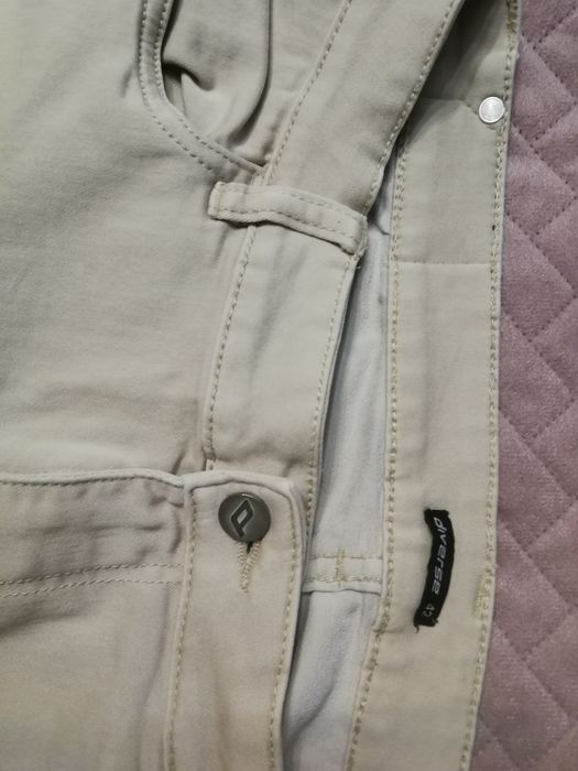 Spodnie rurki z dziurami rozm. 42