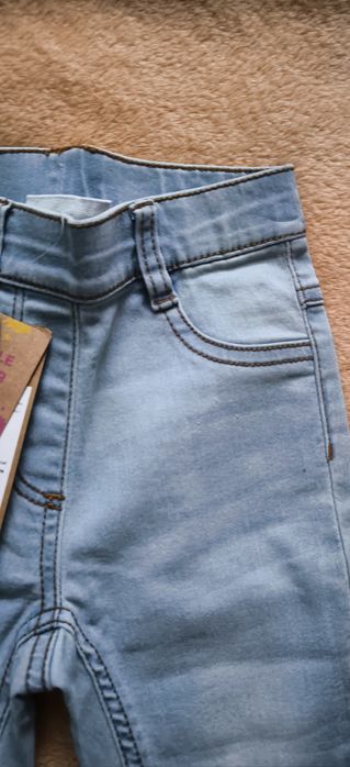 Nowe spodnie jeansowe coccodrillo r. 92