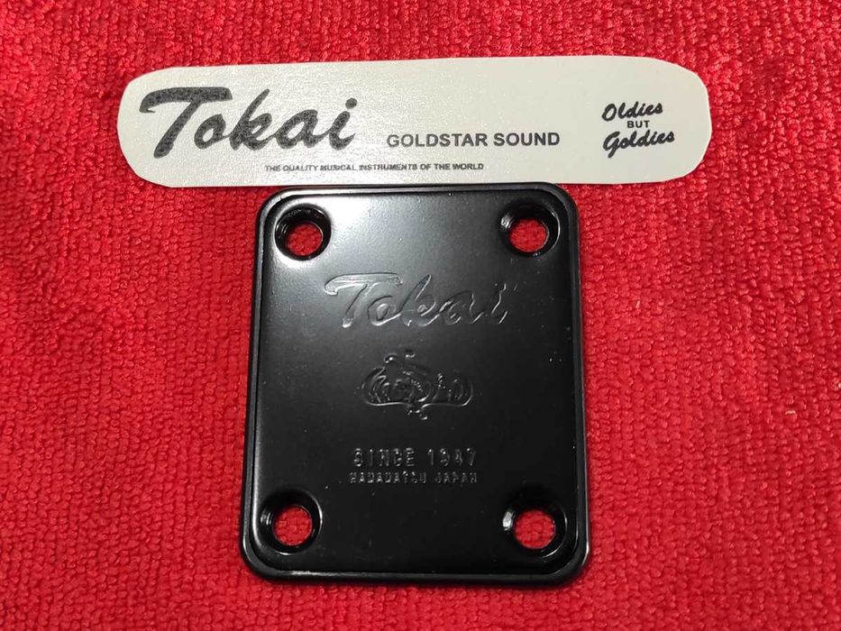 Neckplate i kalkomana do gitary Tokai