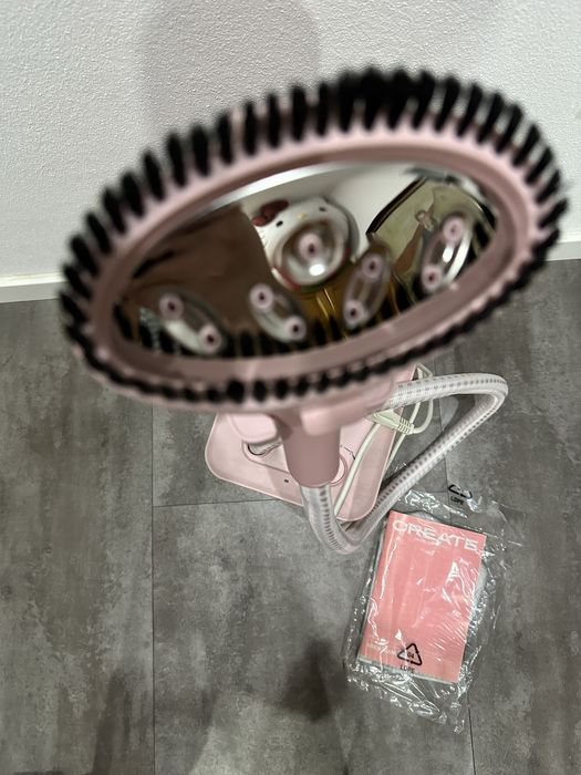 Ferro de engomar de vapor vertical com base