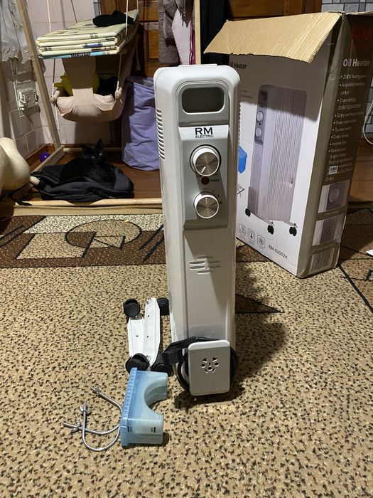 Масляний обігрівач RM-02002E! 9 секцій потужністю 800-1200-2000W