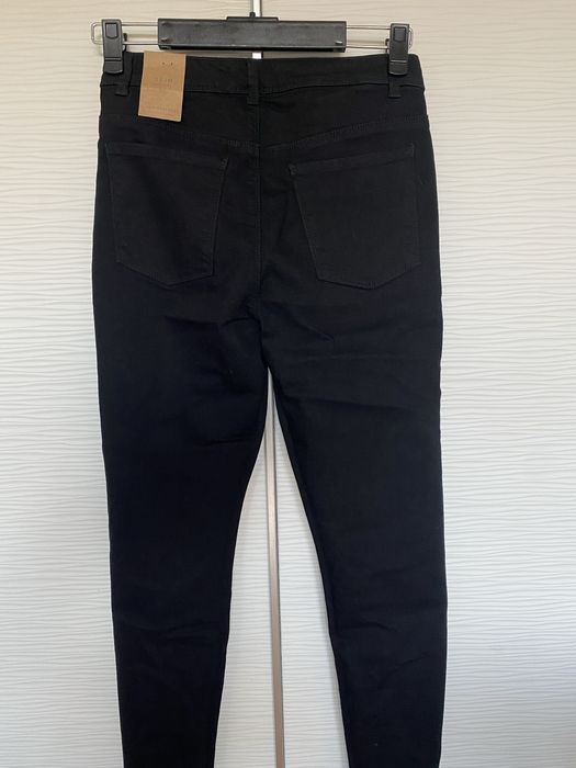 Spodnie jeansy Reserved