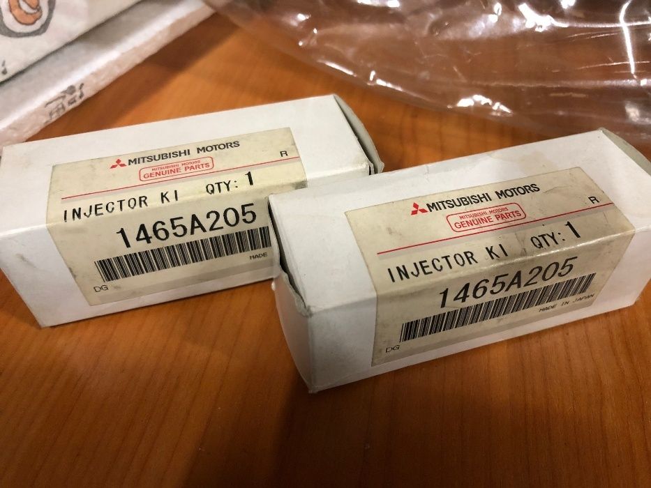 форсунка двигателя Мицубиси аутлендер XL 2,4, 1465A205