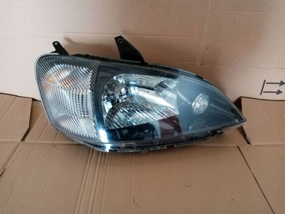 Lampa prawa przednia prawy przód DAIHATSU YRV Kompletna  BDB. EUROPA