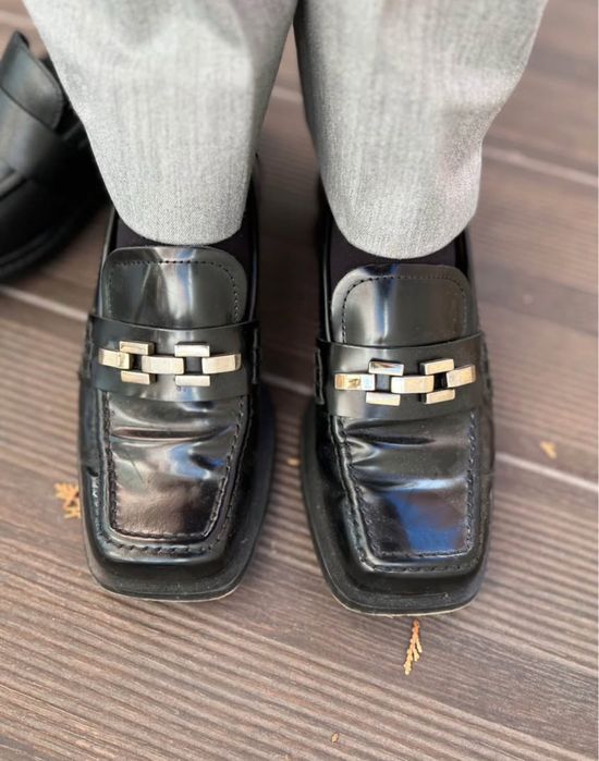 Black leather loafers