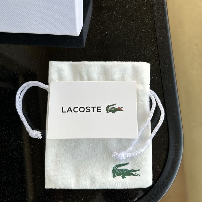 Pulseira lacoste prateada