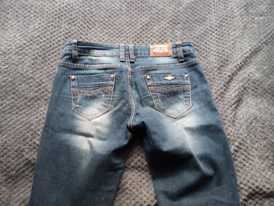 Spodnie jeansy rozm 28
