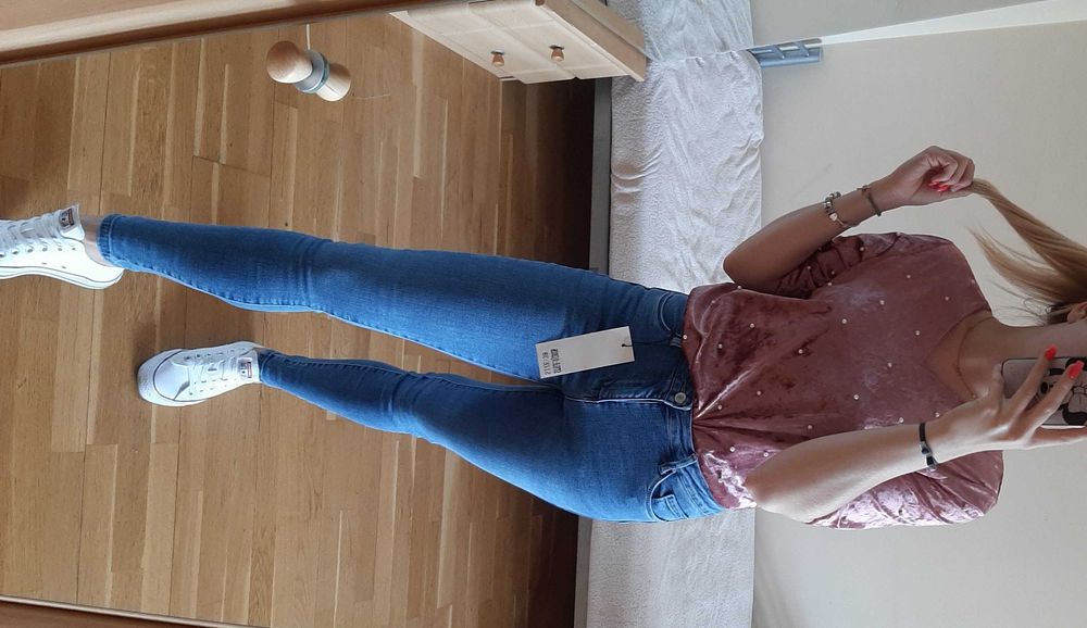Nowe jeansy z metką