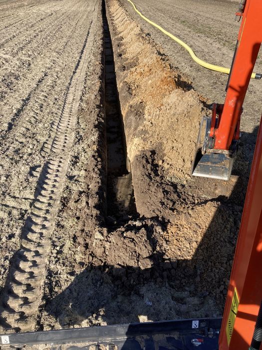 Minikoparka usługi minikoparką wiertnica prace ziemne przyłącza