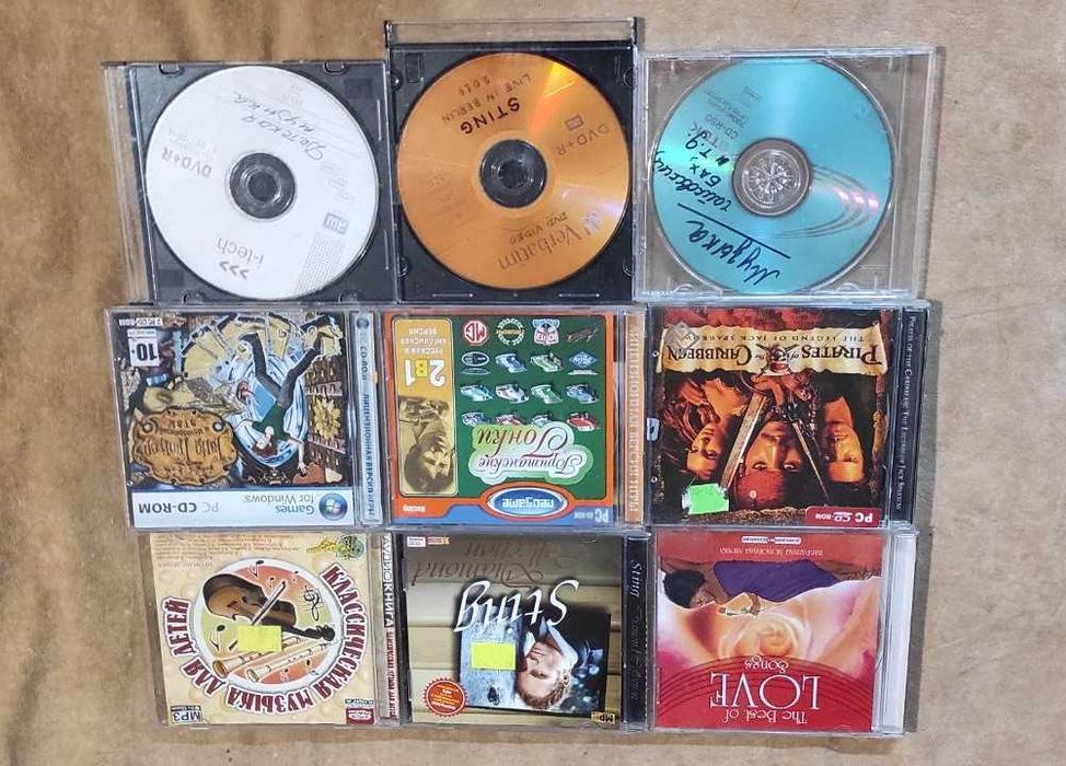 Диски CD, DVD кіно, мультики, караоке, колекції