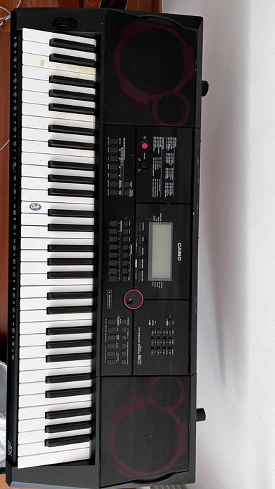 Teclado musical Casio CT-X3000 com suporte