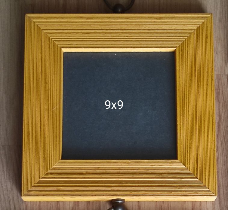 Molduras de parede em madeira para fotos