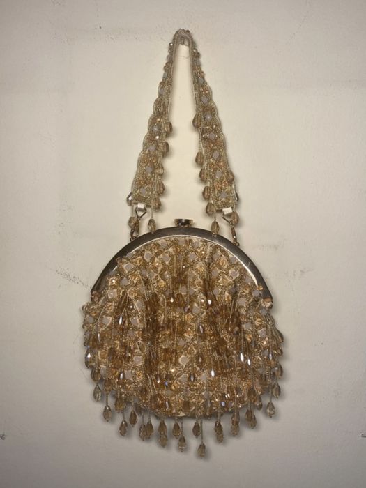 Bolsa indiana feita à mão em dourado com lantejoulas