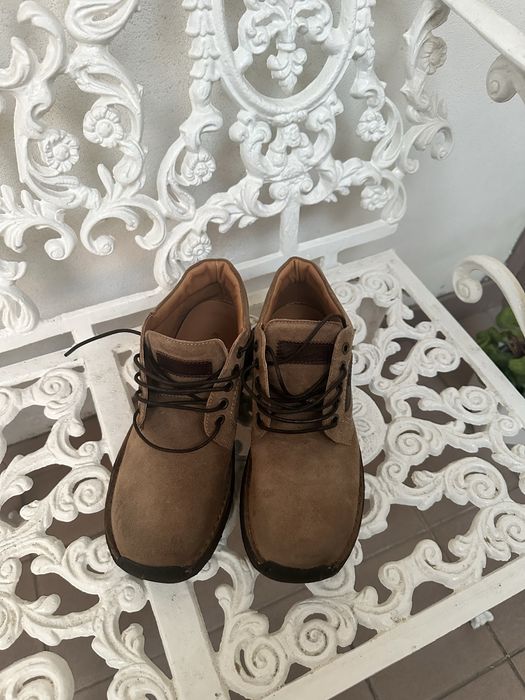 Botas em pele castsnhas