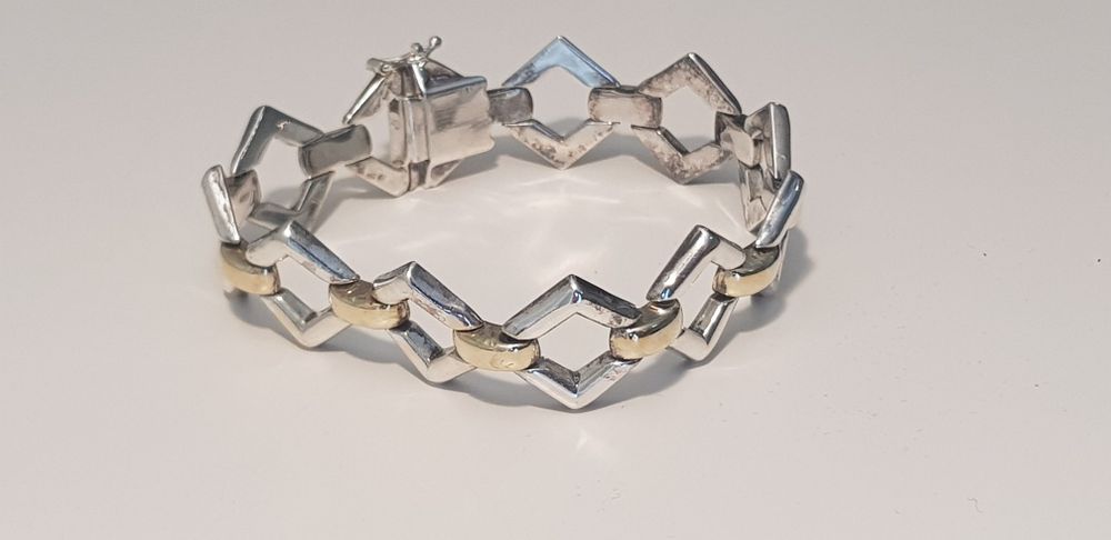 Pulseira semi rígida Prata e Ouro