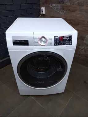Премиум стиральная + сушильная машина Bosch WDU28590OE состояние новой