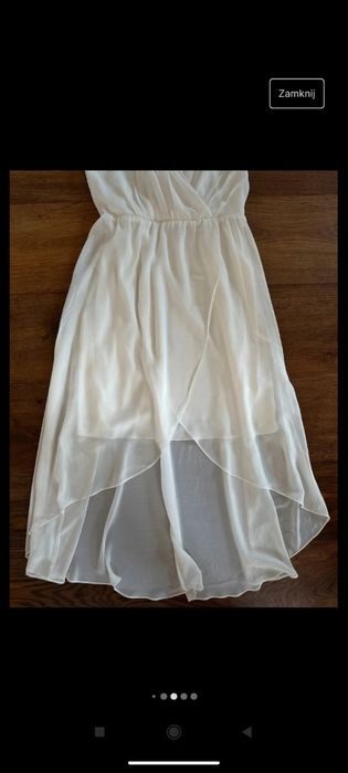 Elegancka biała midi sukienka