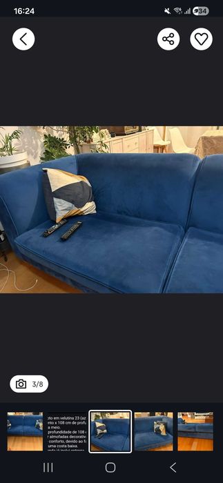 Sofa azul com pouco uso.