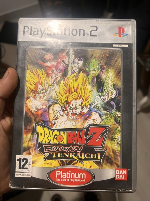 Ps2 com dois jogos e comando