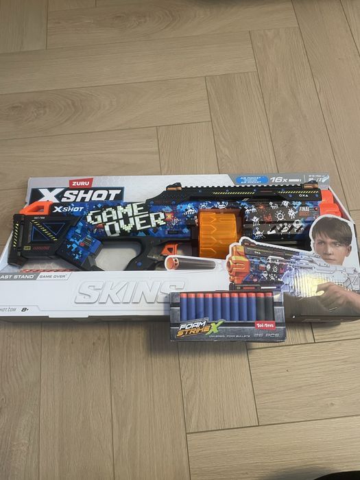 Nowy Karabin XShot Skins Last Stand - Game Over 16 rzutek od ZURU