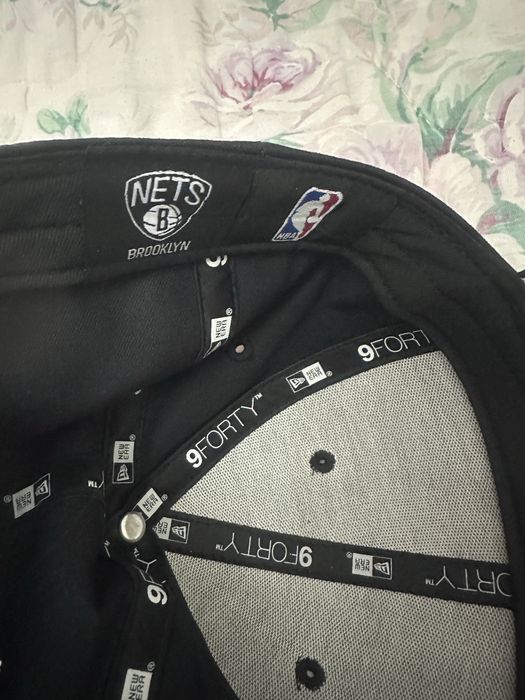 Кепка или бейсболка фирмы new era.NETS.