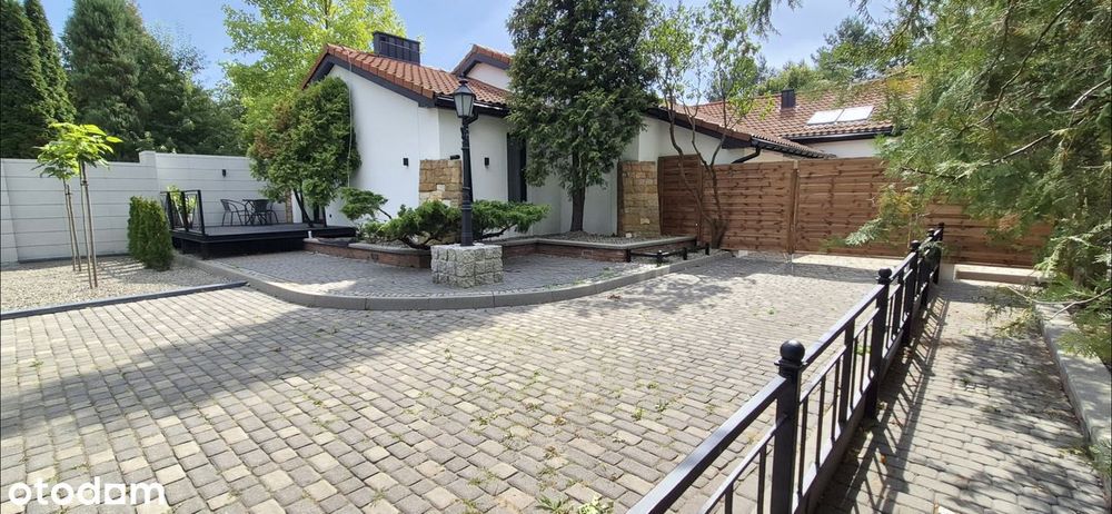 WYJĄTKOWY APARTAMENT z ogródkiem i przestronnym tarasem.